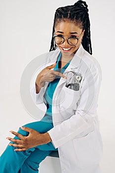 Portrait of happy african american nurse or doctor woman with stethoscope