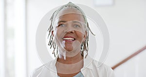 Portrait of happy african american senior woman at home, slow motion