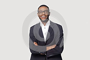 Portrait of happy african american young businessman in formal suit.