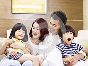 Portrait of happy asian family