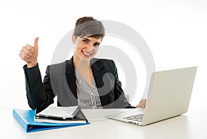 Portrait of happy attractive young businesswoman on laptop looking confident with thumb up