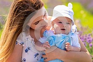 Portrait of a happy baby boy with his mother