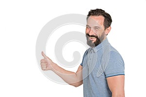 Portrait of happy bearded man keeping his thumb up