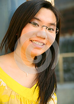 Portrait Of Happy And Beautiful Asian Girl