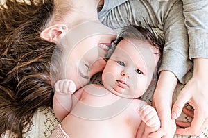 Portrait of happy beautiful mother and cute newborn baby girl