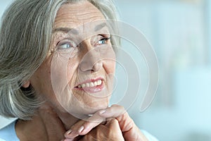 Portrait of happy beautiful senior woman posing