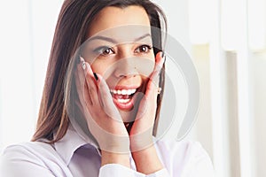 Portrait of happy beautiful surprised businesswoman