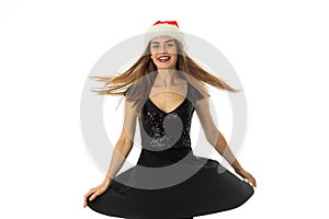 Portrait of happy beauty girl in santa hat