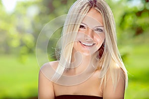 Portrait of happy blond woman