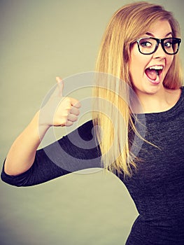 Portrait of happy blonde woman smiling with joy