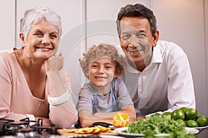Portrait happy boy or grandparents teaching cooking skills for dinner with vegetables diet in family home. Learning