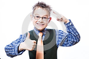 Portrait of happy boy showing thumbs up