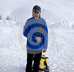 Portrait of happy boy in the snow in Uludag