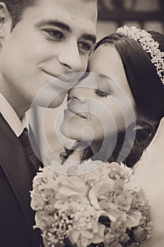 Portrait of happy bride and groom