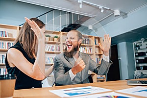 Portrait of happy business people working together at modern office