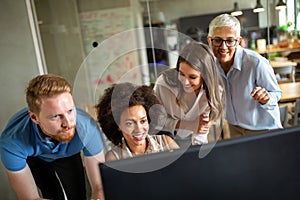 Portrait of happy business women working as a team at the office on meeting