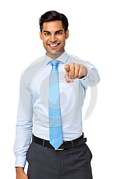 Portrait Of Happy Businessman Pointing At Camera