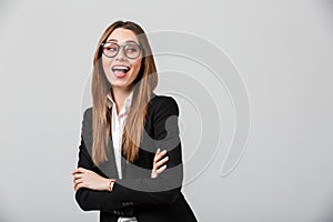 Portrait of a happy businesswoman dressed in suit