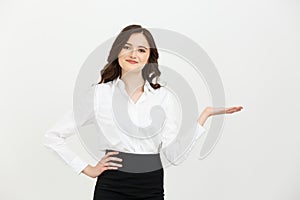 Portrait happy businesswoman showing and presenting copy space in business dress suit on white background.