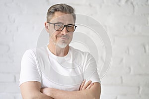 Portrait of happy casual middle aged man smiling