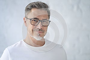 Portrait of happy casual middle aged man smiling