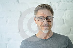 Portrait of happy casual middle aged man smiling