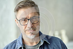 Portrait of happy casual middle aged man smiling