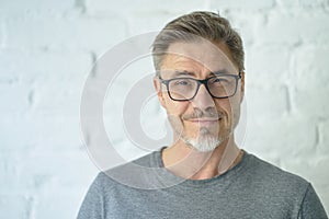 Portrait of happy casual middle aged man smiling