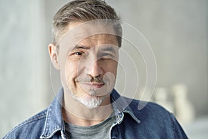 Portrait of happy casual middle aged man smiling