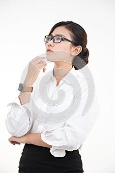 Portrait of happy charming asian young woman with white collar  shirt looks away to the side, thinks and plan with positive