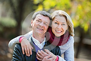 Portrait of happy charming elderly couple