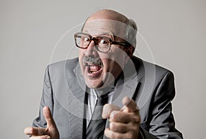 Portrait of happy and cheerful senior mature 60s business man smiling wearing dressing formal necktie looking cheerful and excited