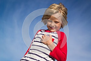 Portrait of a happy child outdoors