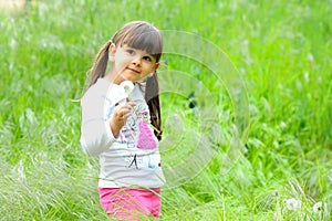 Portrait of happy child in spring.