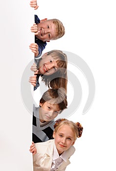 Portrait of happy children with white blank