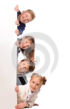 Portrait of happy children with white blank