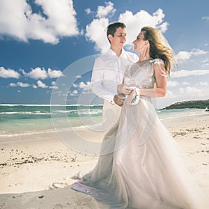 Portrait of happy couple at beach. Traveling at Thailand