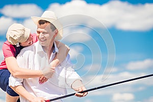 Portrait of happy couple on fishing