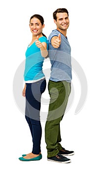 Portrait Of Happy Couple Gesturing Thumbs Up