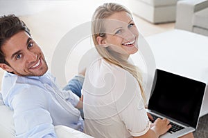 Portrait of happy couple, laptop or mockup for home planning, research or typing online. Information, back and people