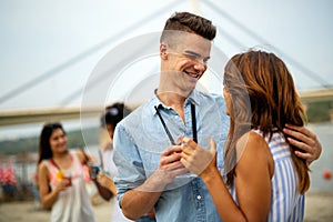 Portrait of happy couple in love having fun on vacation party. Travel people happiness concept