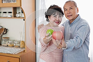 Portrait of happy couple senior asia woman and retirement man having breakfast together