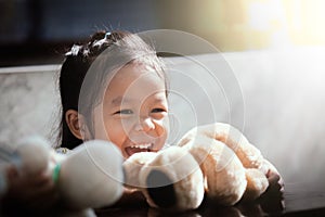 Portrait of happy cute asian little girl laughing