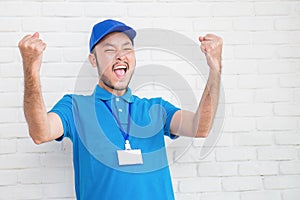 Portrait of happy delivery asian man isolated on white background