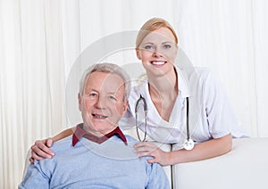 Portrait of happy doctor and patient