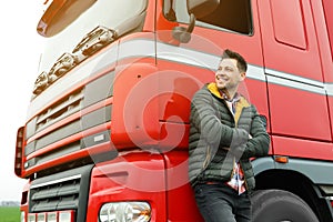 Portrait of happy driver at modern truck