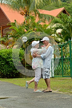 Portrait of a happy elderly couple hugging