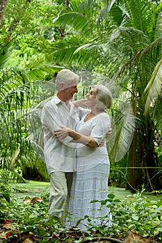 Portrait of a happy elderly couple hugging