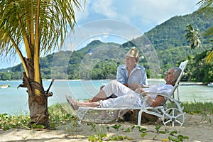 Portrait of a happy elderly couple resting