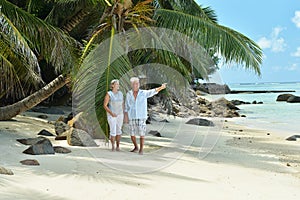 Portrait of a happy elderly couple resting